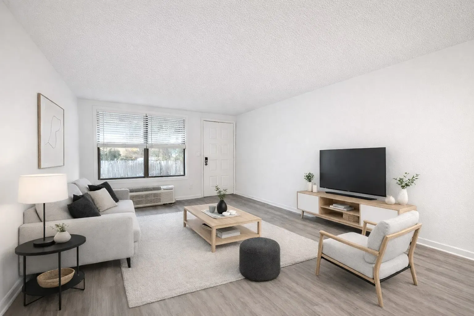 Furnished living room in a Stone Cove apartment